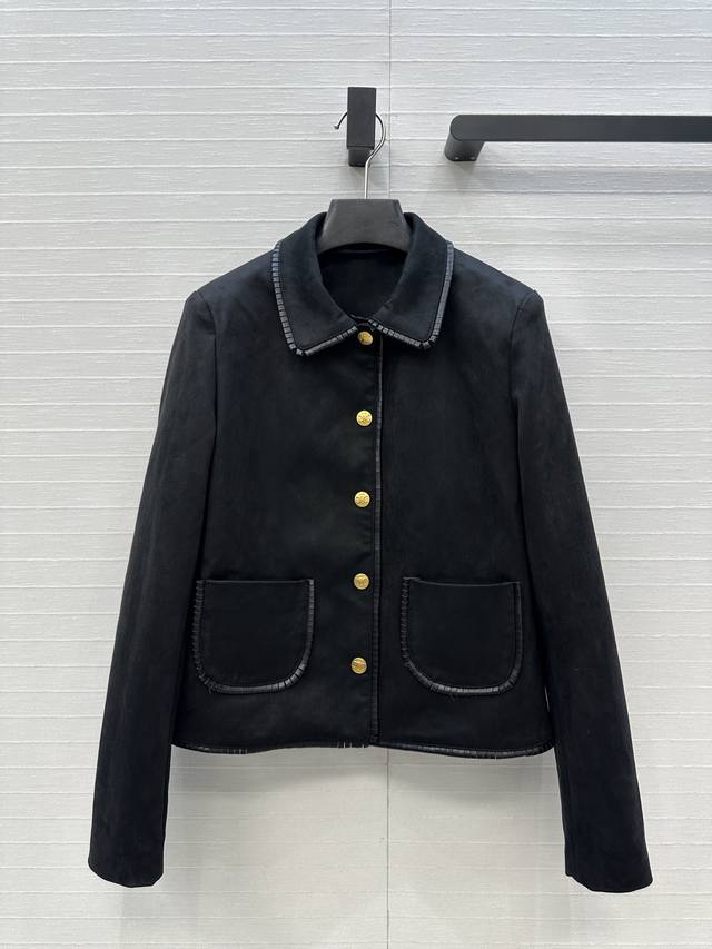 Highly recommend Suzy's black suede Arc de Triomphe jacket with gold buttons an