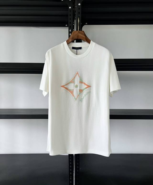 No comparison required. This T-shirt features vibrant 3D Monogram florals on th