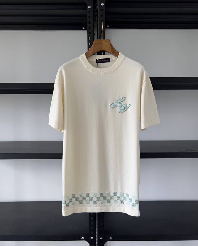 No original product. Donkey brand Damier check embroidered crewneck sweater. He
