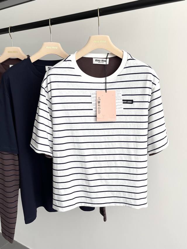 25New's reversible striped crewneck short-sleeve top is so cool this year! Black