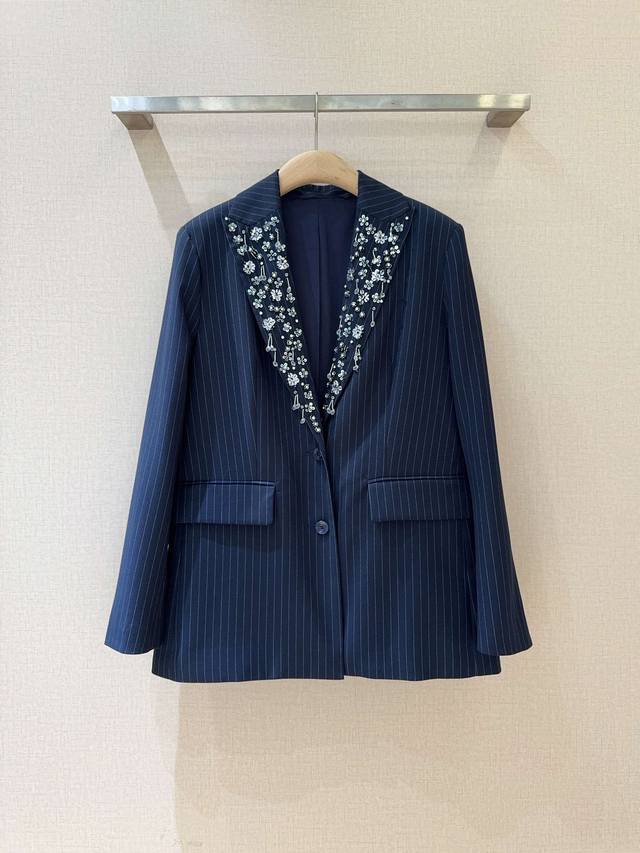 Tanya Tayl*O*R New Arrival Recommendation: This pinstripe blazer features a clas