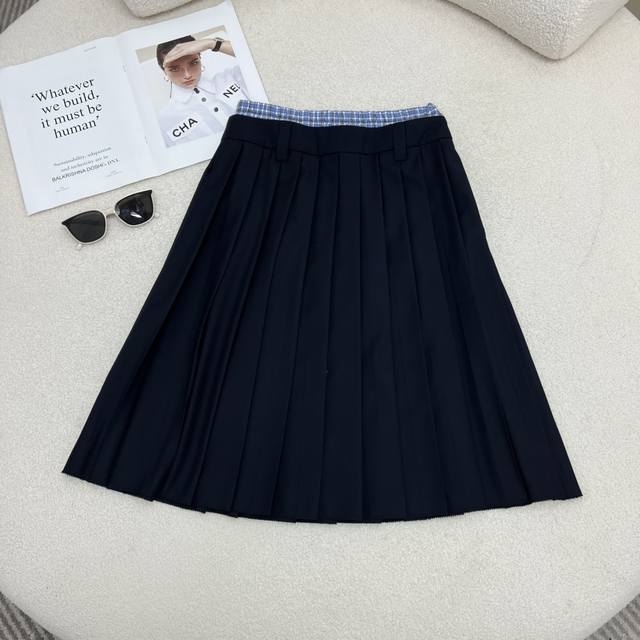 Fake two-piece contrasting plaid waistband pleated skirt in two lengths, suitabl