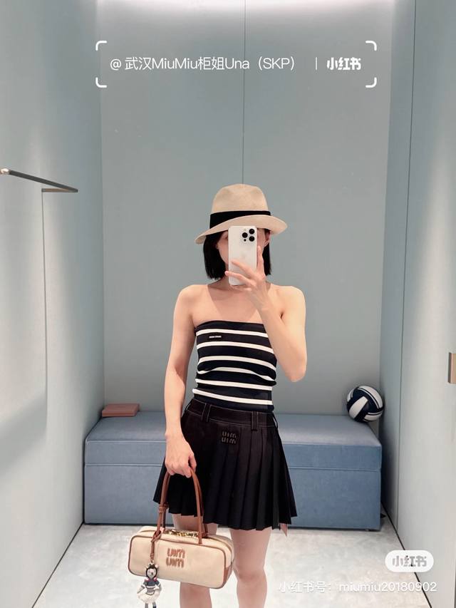 Miu25Ss Spring/Summer new military blue preppy style girl pleated short skirt. I