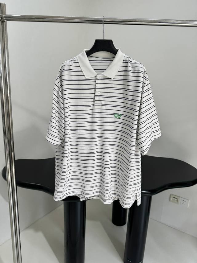Laurel Classic's new pique cotton Polo T-shirt. Contoured silhouette. DDD. Exclu