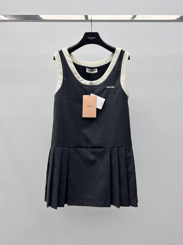 Miumi* Pleated Gray Dress Holiday Collection A loose-fitting, chic pleated dress