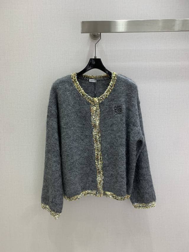 Highly recommend Loe*'s new 2025 early fall knitted cardigan. The gold-trimmed