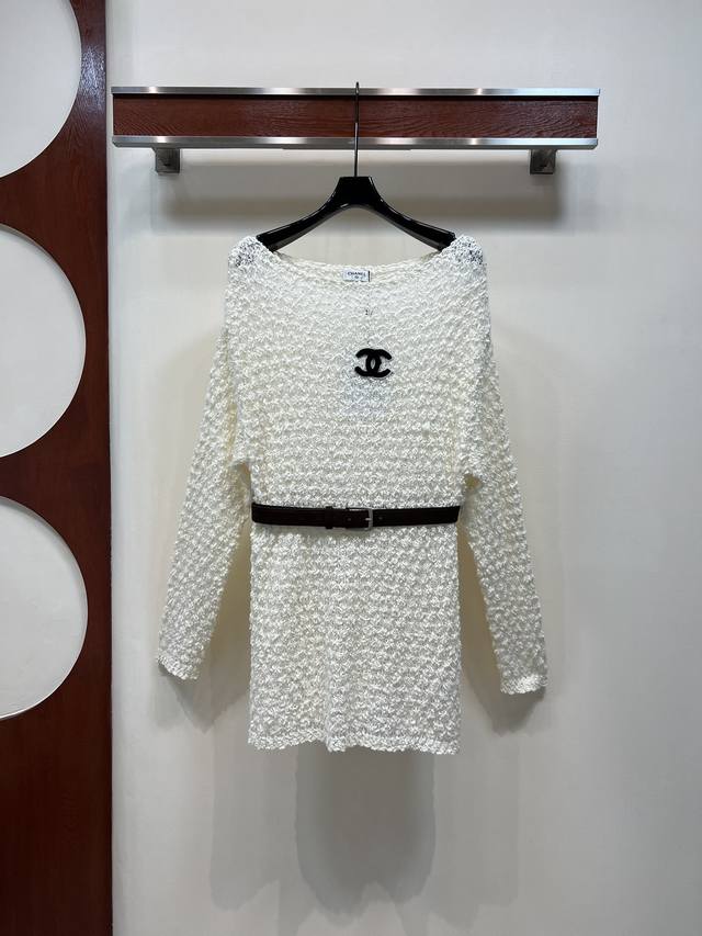 Chanel's new 25th fall collection features a belt-adorned knitted cardigan with