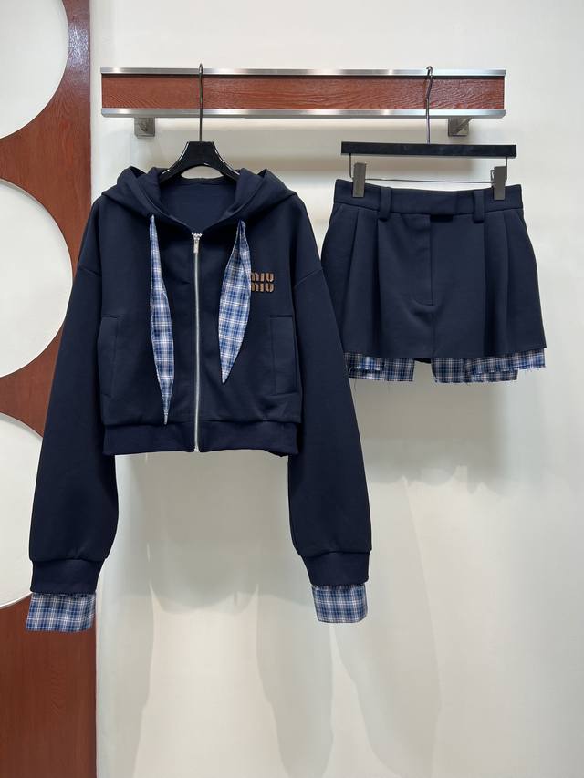 Miu's new 25th-century hooded cropped sweatshirt jacket with a high-waisted plea