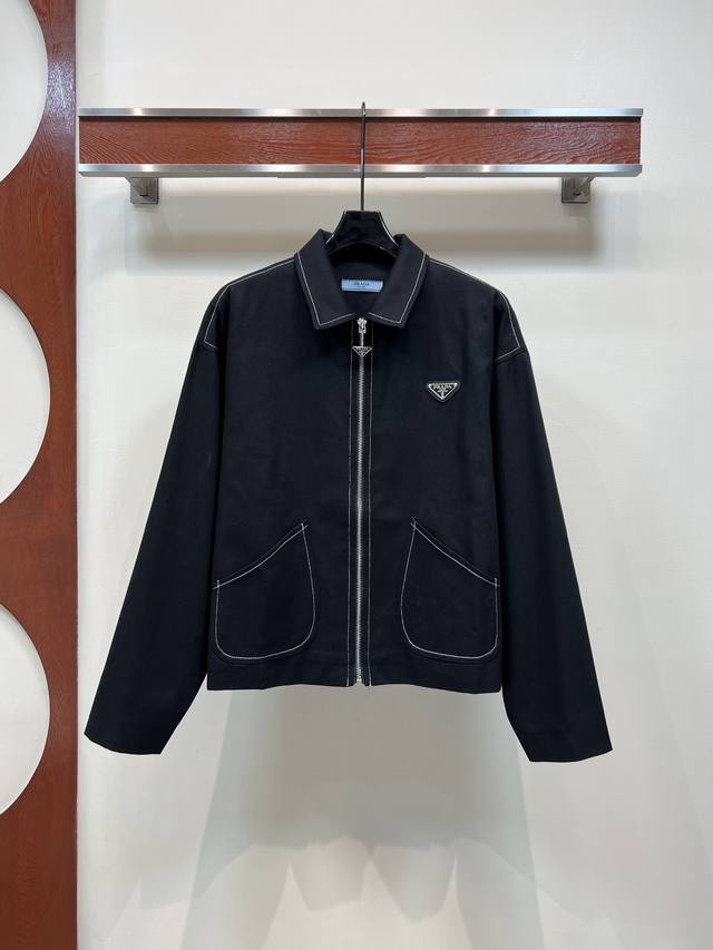Pd's new early fall 25 lapel denim jacket. The three-dimensional cut and stiff s