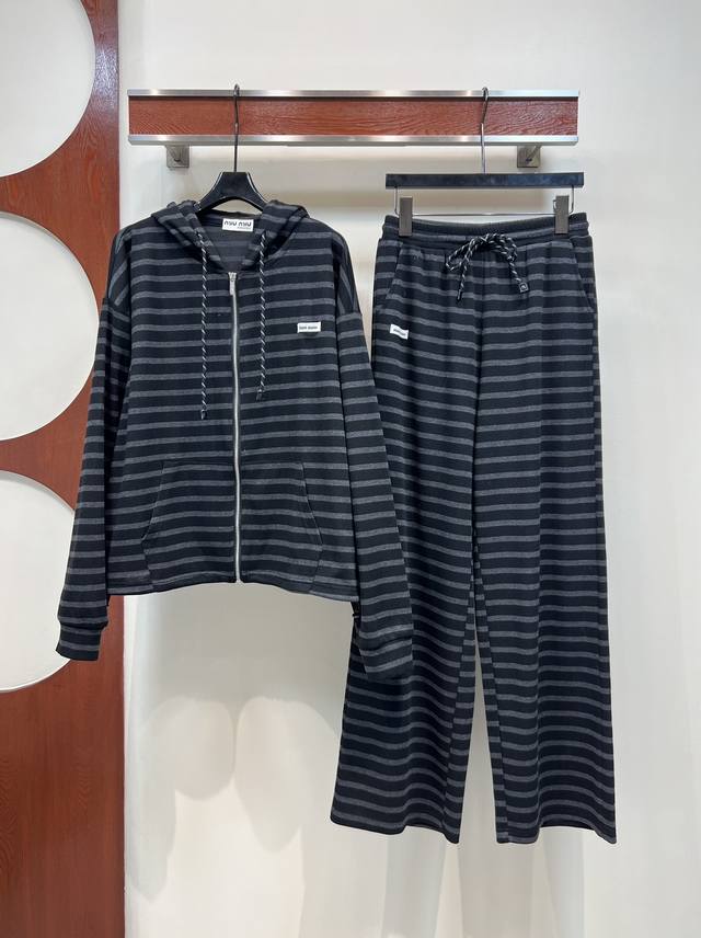 Miu's new striped casual suit for early fall 2025: a hooded zip-up sweatshirt ja