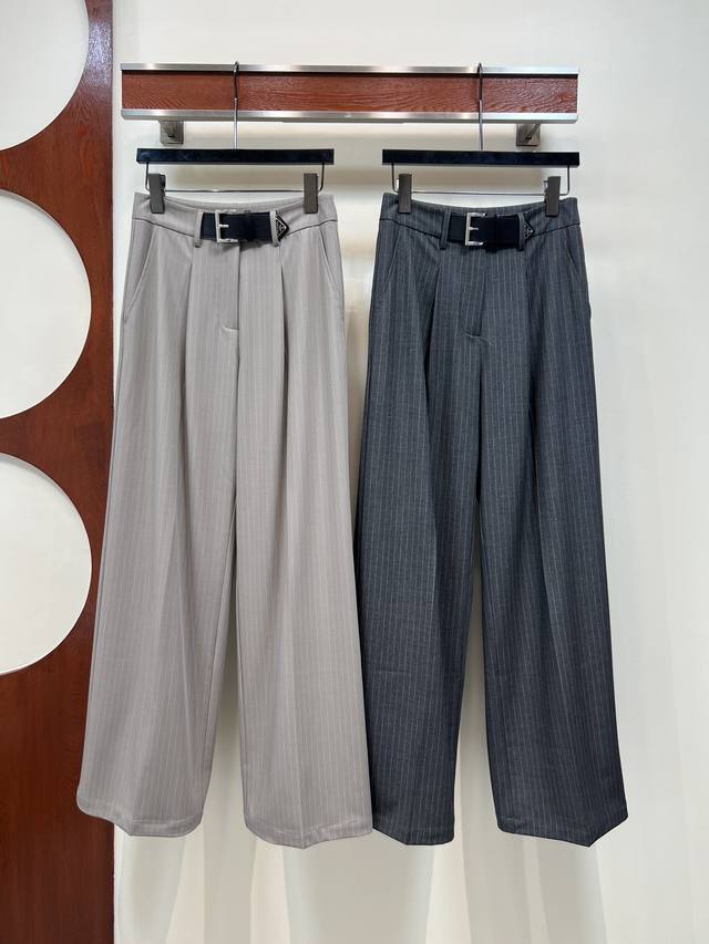 Pd's new 25-piece early fall triangle logo suit pants. Button closure with hook