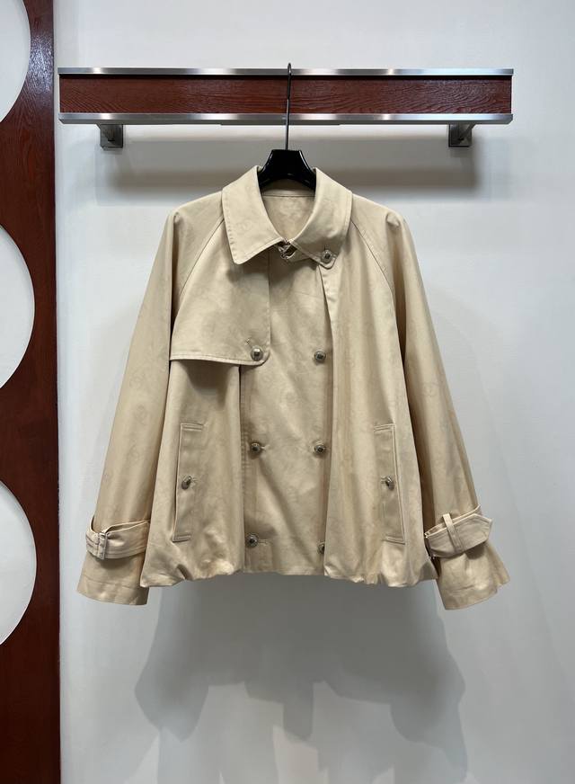 Chanel's new 25th fall short trench coat features a floral bud design. The loose