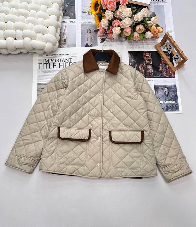 Miu Miu's new early fall light cotton diamond quilted short coat jacket features