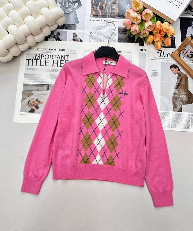 Miu Miu's new Autumn/Winter 2025 lapel half-zip sweater features a Miu Miu lapel