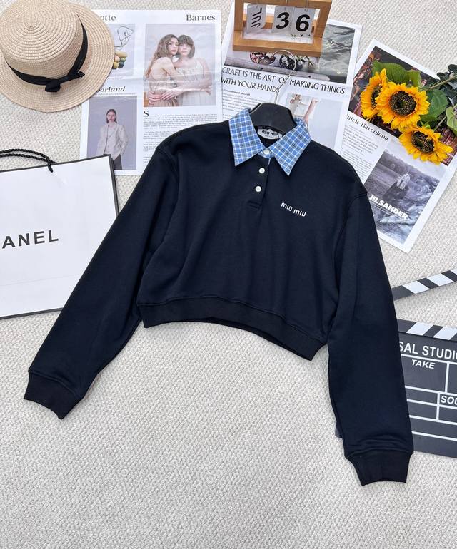 Miu Miu's new early spring logo-embroidered Polo sweatshirt. This cropped cotton