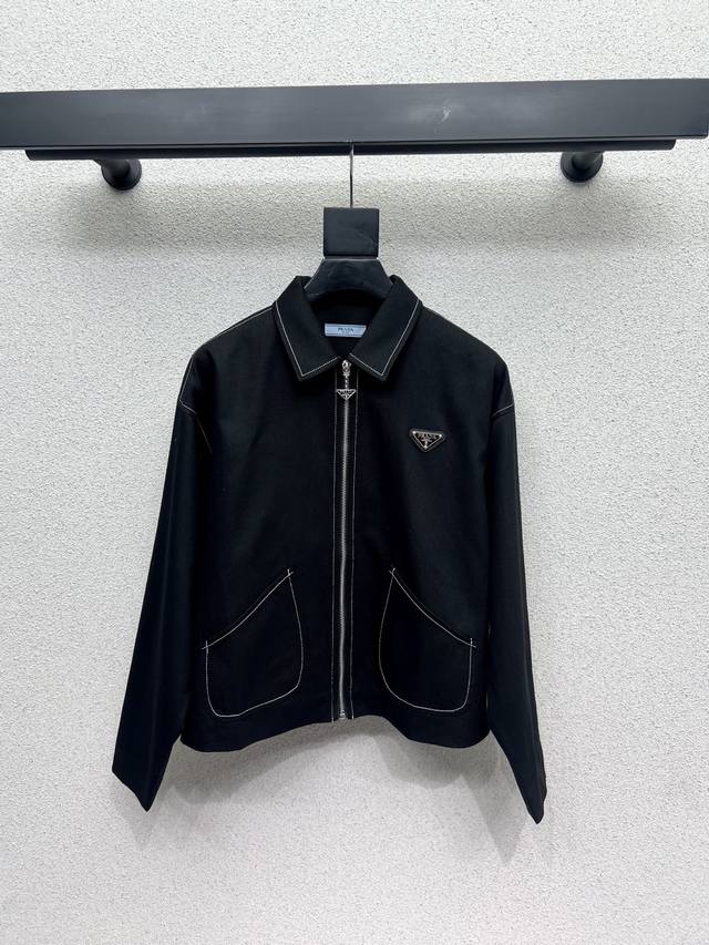 P's triangle-label zippered jacket is stylish, understated, and luxurious! The s