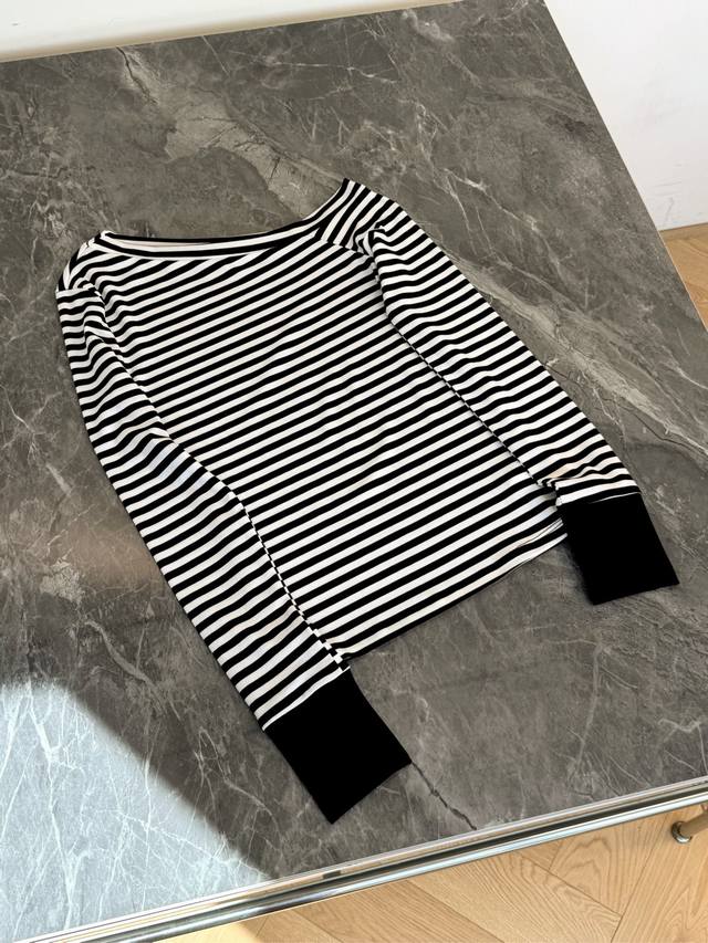 25 New classic black and white striped T-shirt. The ever-popular one-shoulder de