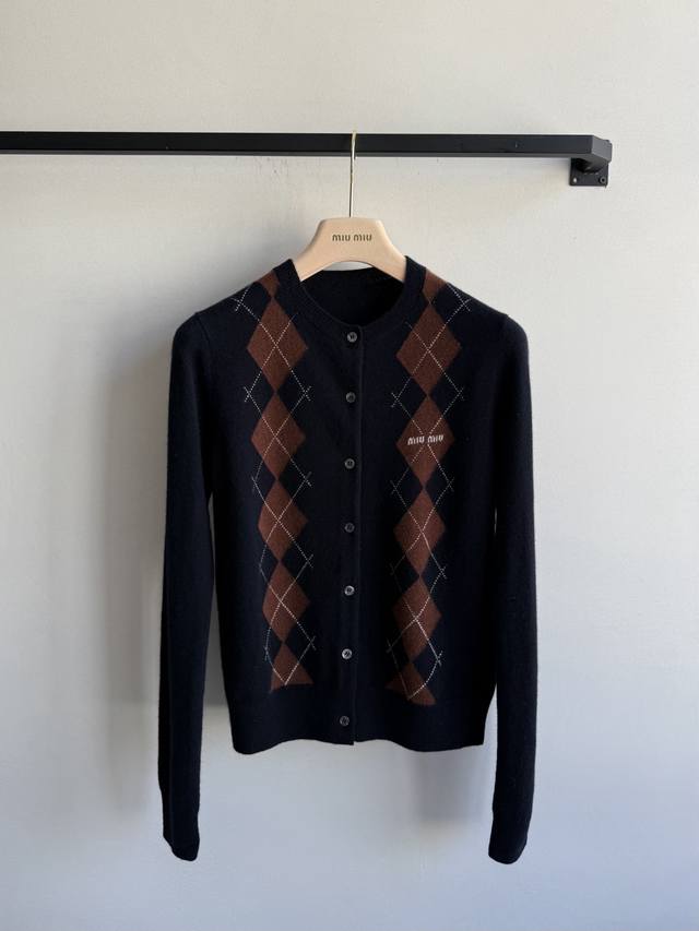 Miumi* Logo diamond knit cardigan, with a three-dimensional cut that creates a s