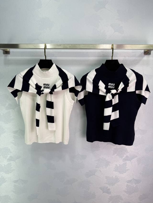 Miu*25's new early fall black and white striped knitted shawl paired with a matc