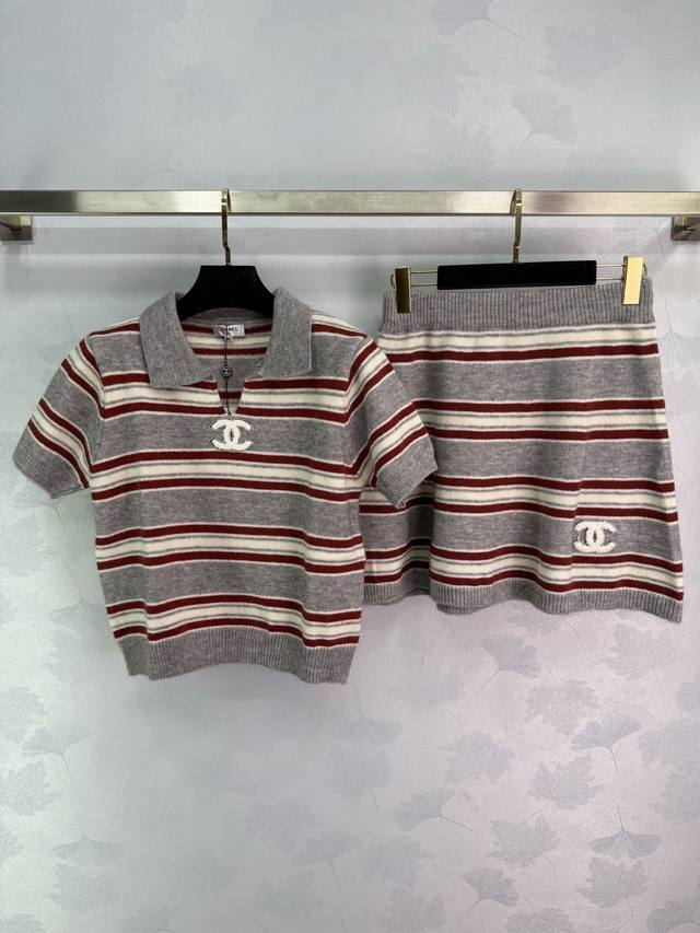 Ch*25 New early fall striped knit suit. Contrast stripes and a double C logo on