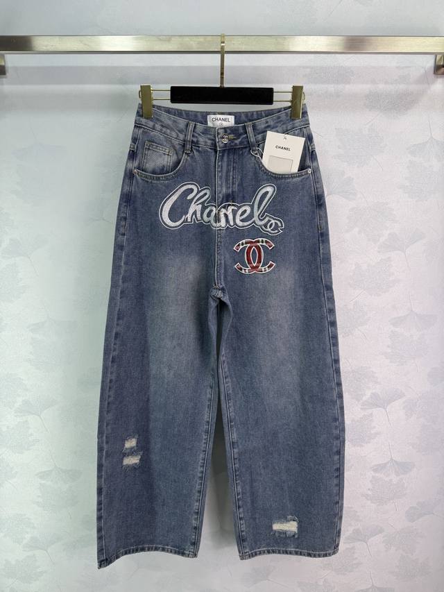 Ch*25 Early Fall new jeans, blue washed and distressed, with embroidered logo on