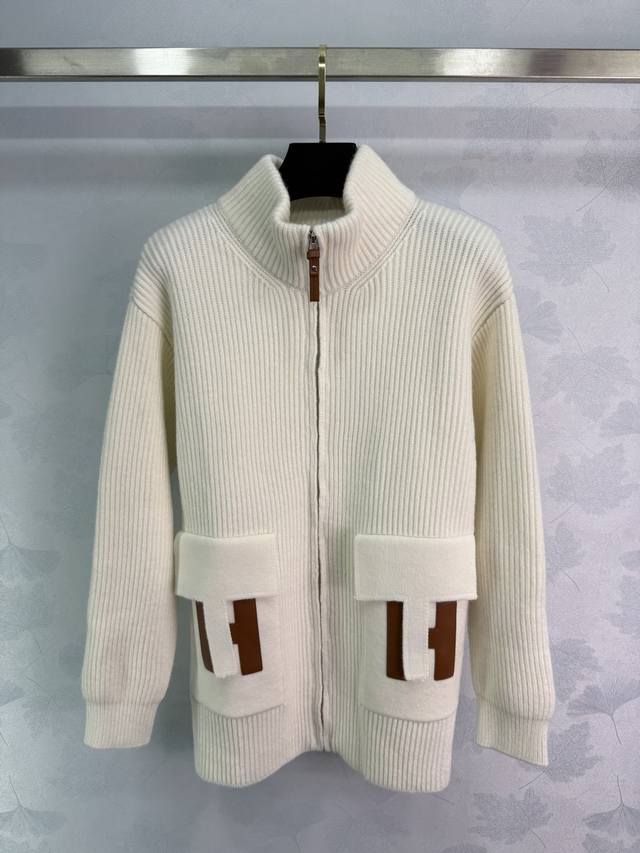 AIMA* white wool cardigan with double chest pockets and a brown leather label,