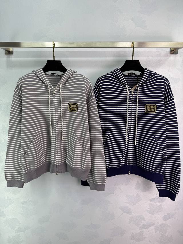 Miu striped hooded knit sweatshirt, available in navy blue and gray. The classi