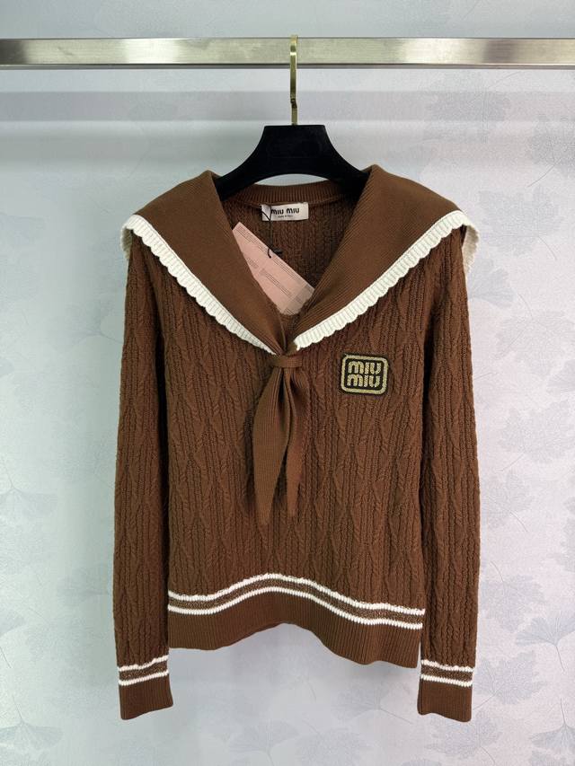 Miumiu brown navy-collar sweater with white stripes and a gold logo on the chest