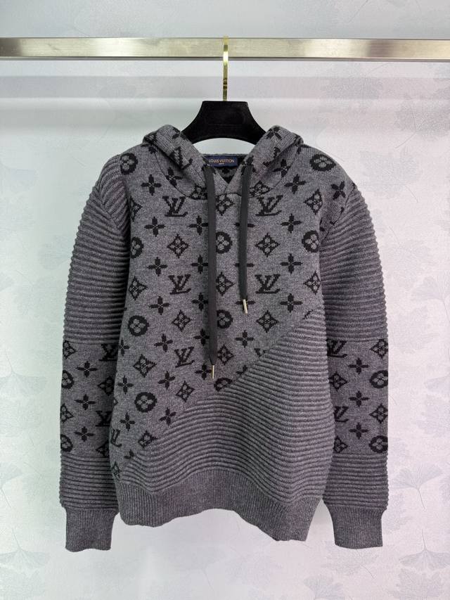 Lou* This gray all-over printed hooded sweatshirt is crafted on imported German