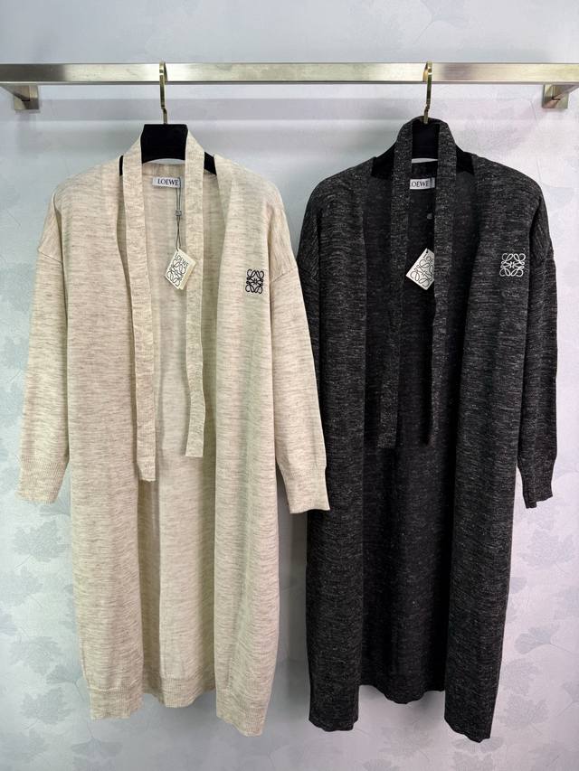 Loewe two-tone knit cardigan, available in off-white and black. Exquisitely embr