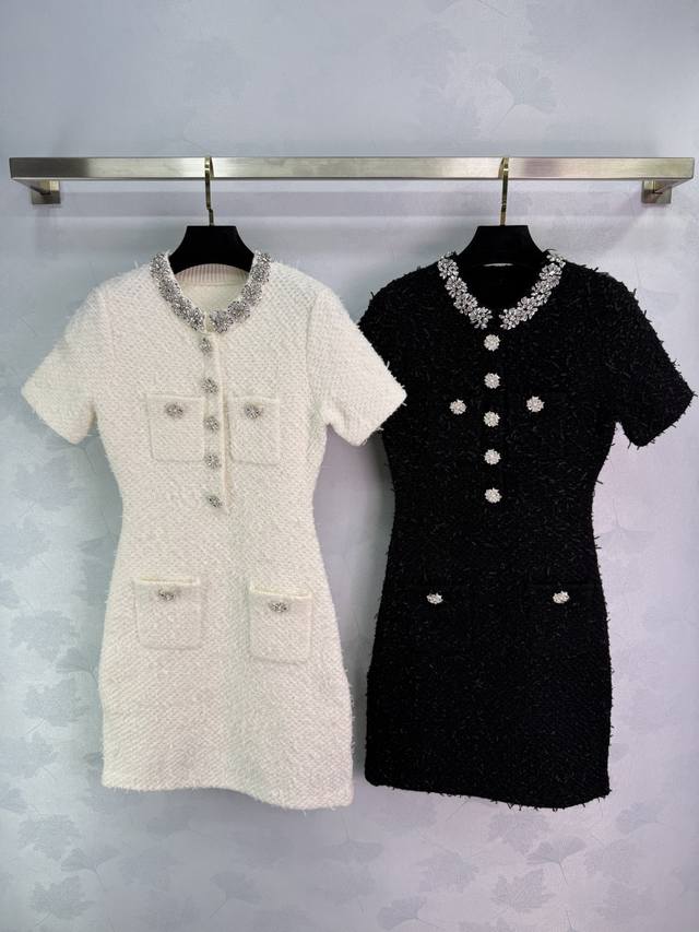 Self-Portrait Chanel-style dress, available in black and white, features a diamo