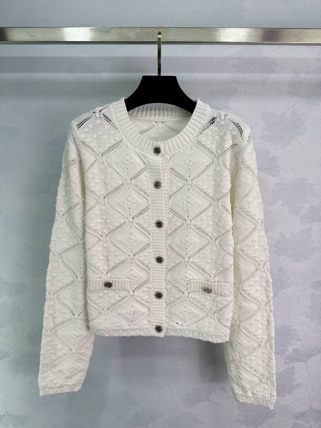 Chane* Diamond check knit cardigan with delicate openwork pattern. Round neck, b