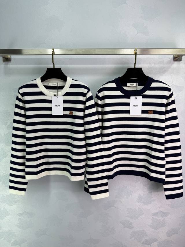 Celine striped sweater, featuring chest embroidery, is simple, elegant, and refi