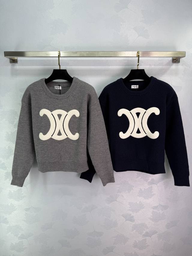 Celin* Celin's new loose-fitting, fashionable, cropped, long-sleeved pullover sw