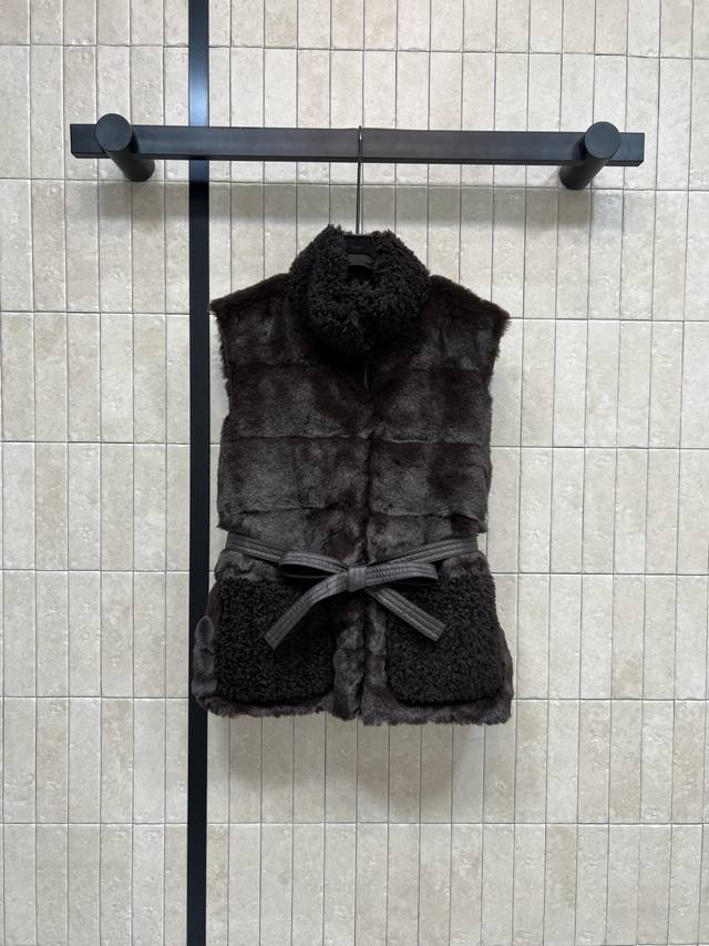 M's new early fall 25 down vest with plush belt is stylish and fashionable. The