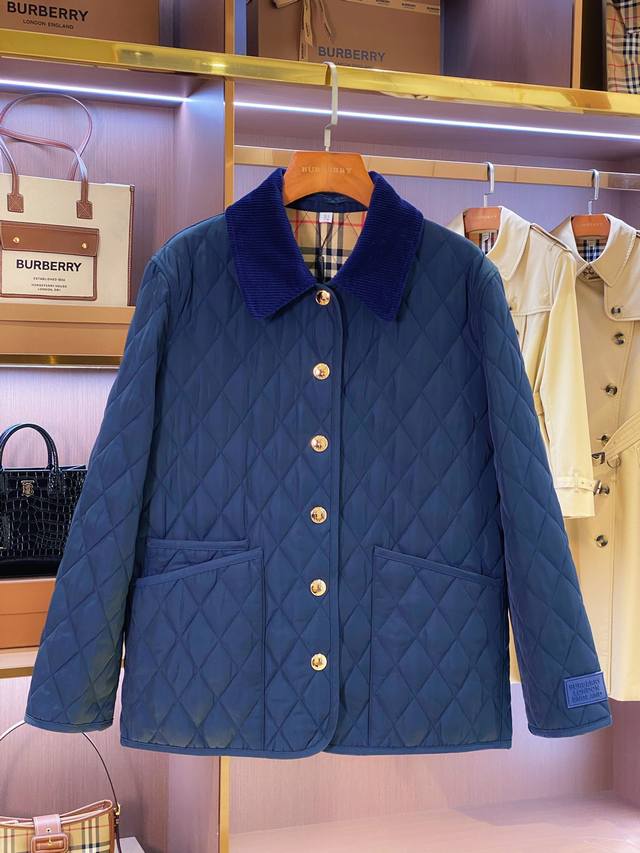 Bur Women's Corduroy Lapel Quilted Jacket in Navy Blue and Black. Bur's flagship