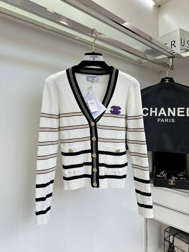 25 F The latest cardigan with contrasting stripes is a perfect way to show your