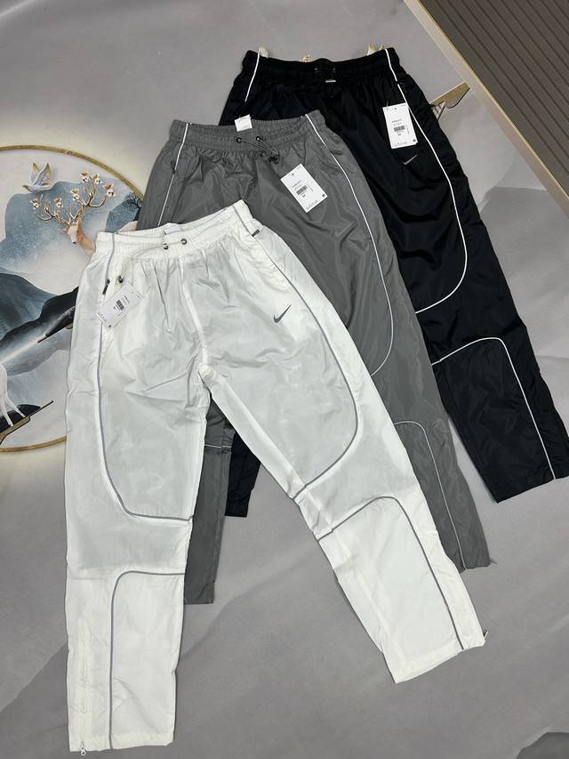 New Early Fall 2025 Nike tri-color casual pants, unisex, zippered at the cuffs!