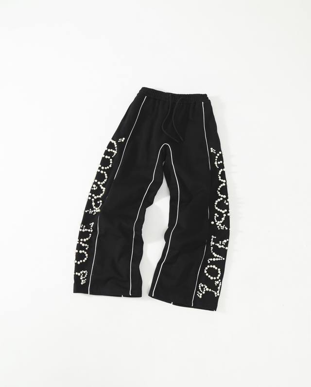 Goodbrand's stylish, luxurious, high-end casual trousers with pearl-embellished