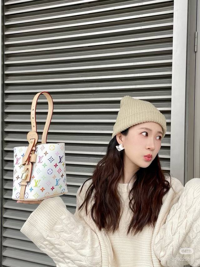 Lv Murakami Takashi's white tri-color All In Bb bucket bag. Monogram canvas with