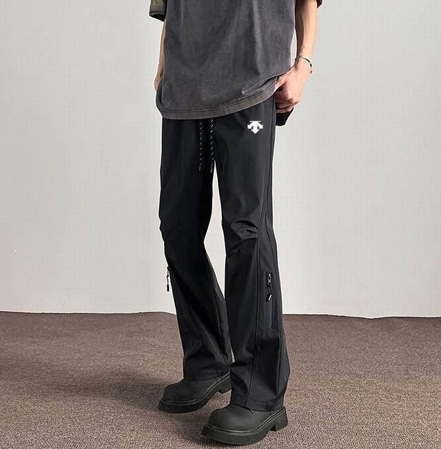 Descente outdoor waterproof trousers, unisex casual pants, made with this year's