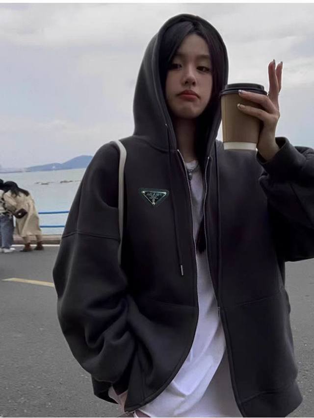 New Arrival : Prada's classic, essential hooded sweatshirt jacket with a simpl