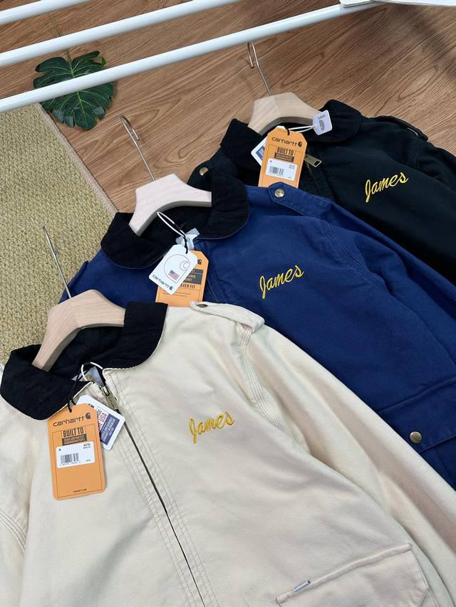 Details# Carhartt spring jacket with heavy embroidery of an eagle on the back wi