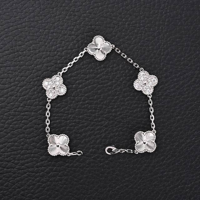 Van Cleef & Arpels Vca laser-engraved silver and diamond four-leaf clover five-