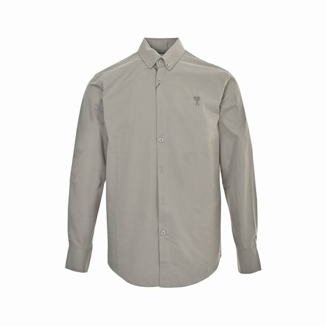 Ami paris shirt with a small heart embroidered on the chest in the same color. -