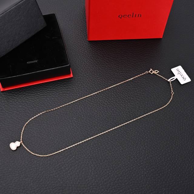 Qeelin Kirin Mini Natural White Mother-of-Pearl Gourd NecklaceThe word "gourd" s