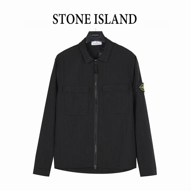 Stone Island's classic solid-color logo patch with lapel and zippered sun protec