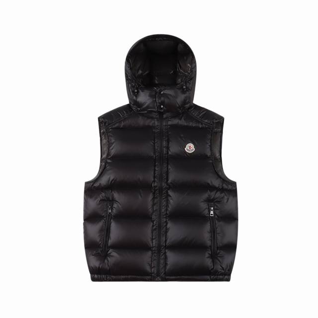Moncler's classic stand-collar hooded down vest is available at the Shanghai IFC