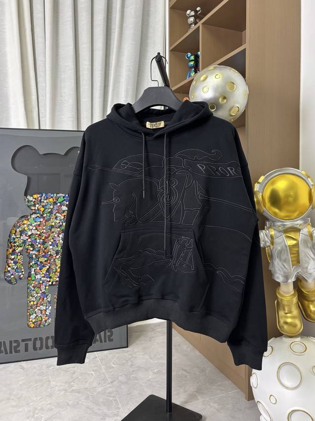 Burberry's classic Warhorse double-layer embossed embroidered hooded sweatshirt.