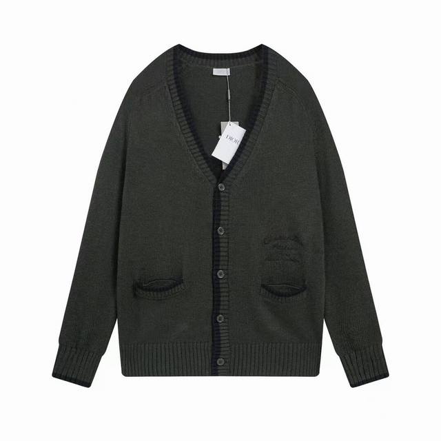 Dior's new dark green embroidered cardigan. This unique color is crafted from a